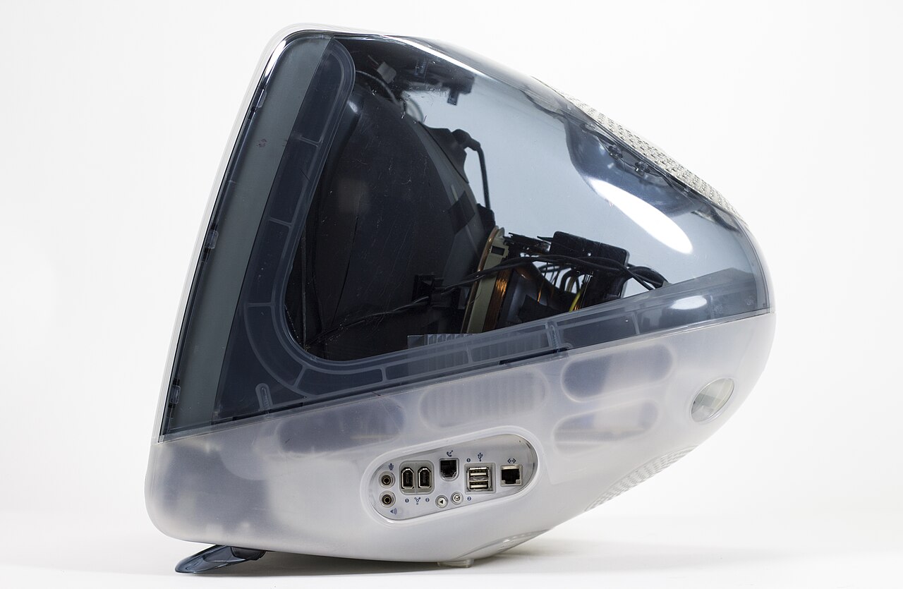 A graphite iMac G3 photographed from the side